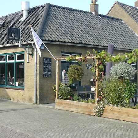 Eetcafe/Pension Nooitgedacht Strijen Exterior foto